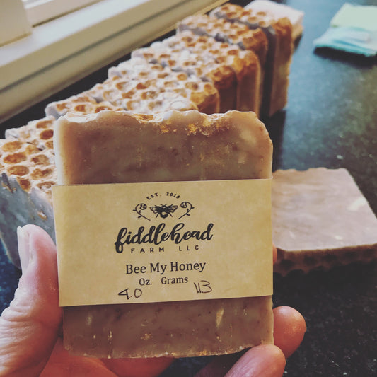 Brown natural handmade soap. Honey beeswax oatmeal soap. Large brown bar with a hive decoration on top. gold mica shimmer top.